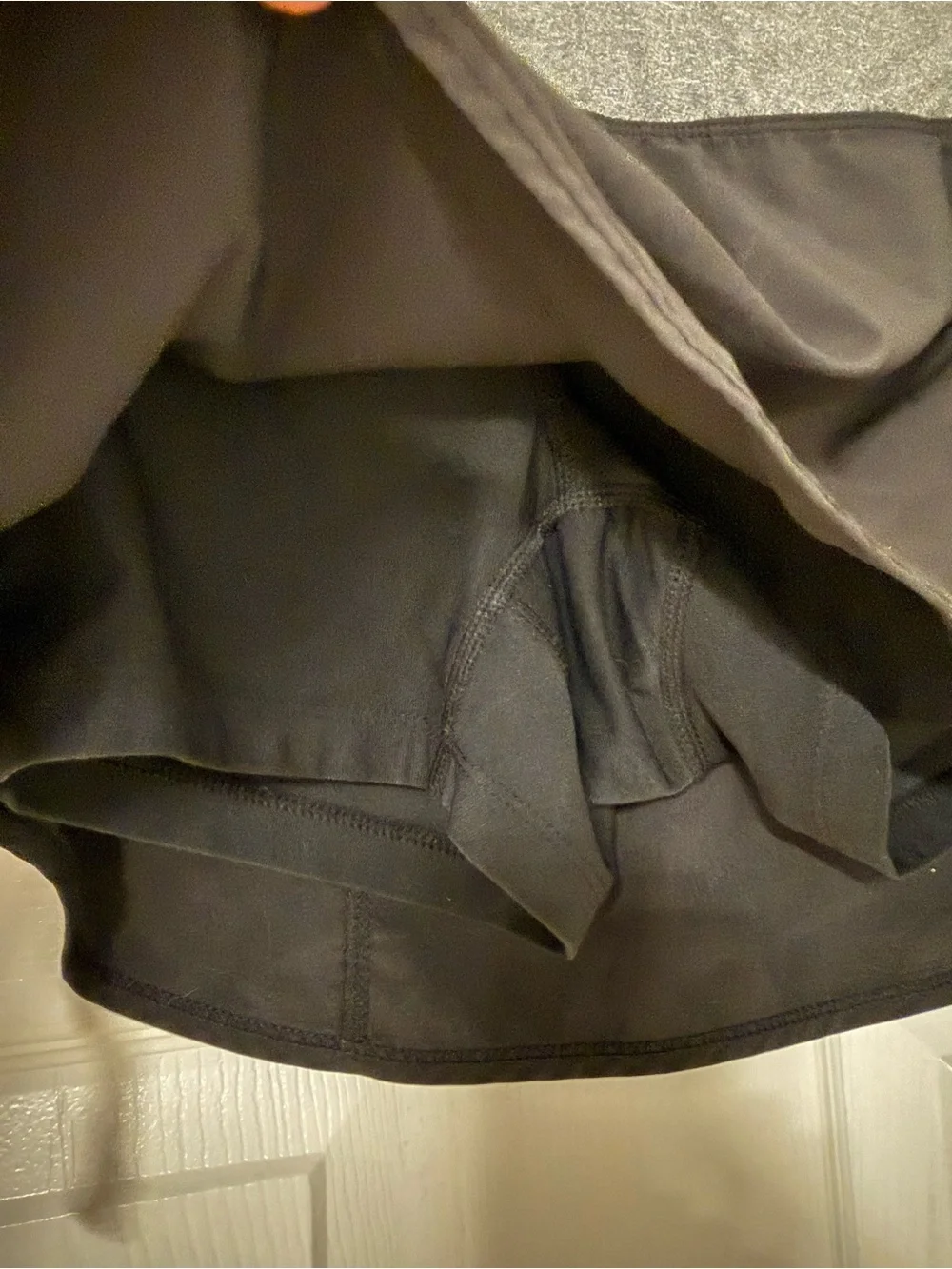 Two Nike Black Tennis Skirts 1 with Gray Waistband